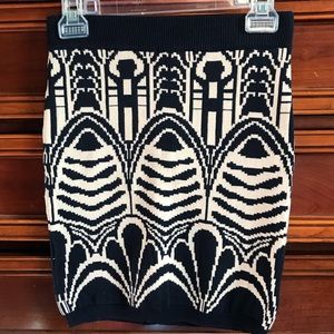 Navy and tan patterned cotton mini skirt. Size M.